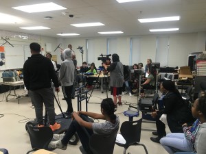 Blocking the scene in a well lit classroom